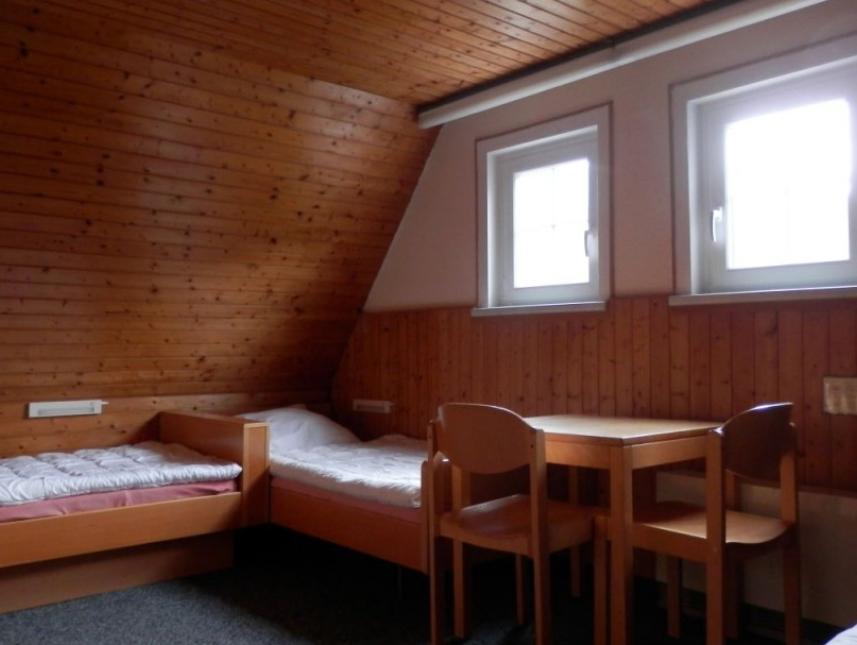 Zimmer mit drei Betten