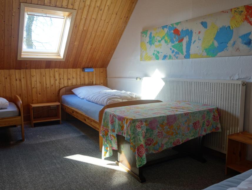 3-Bett-Zimmer auf dem Dachboden