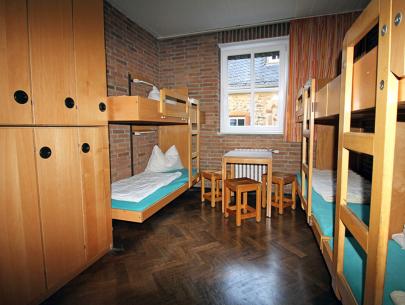 Gruppenzimmer mit vier Betten