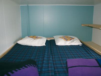 das Doppelhochbett im 3-Bett-Zimmer im OG