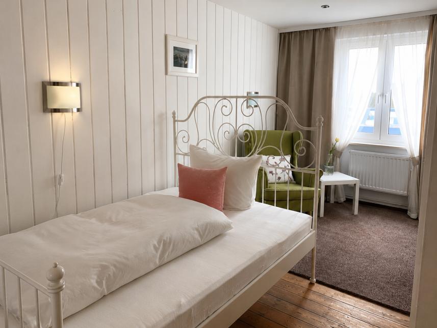 Zimmer mit Queensizebett  