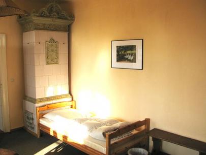 3-Bett-Zimmer mit Gründerzeitofen