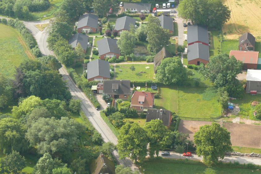 Apartmenthäuser, Tafelhus, Reetdachhaus