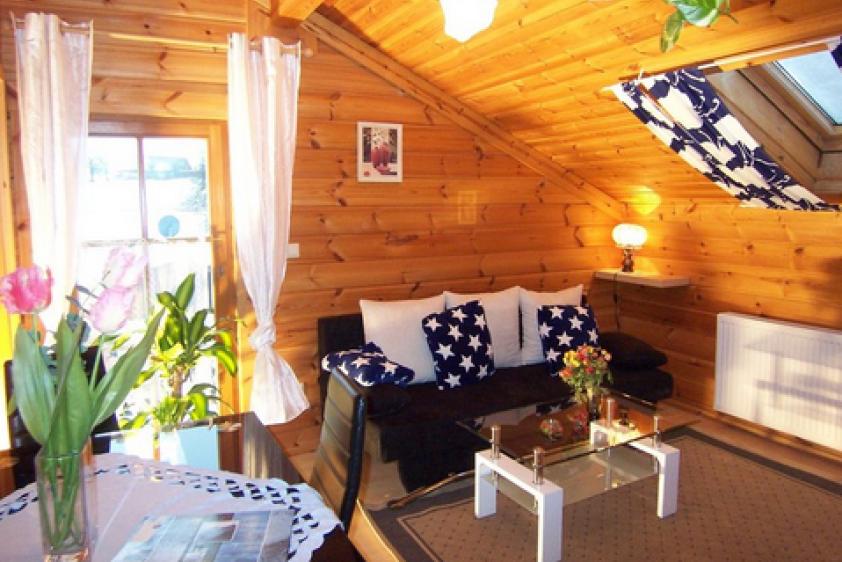 Blockhaus Suite B Ferienhaushotel mit Kamin