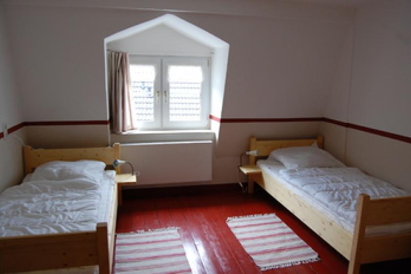 Doppelzimmer mit Holzboden