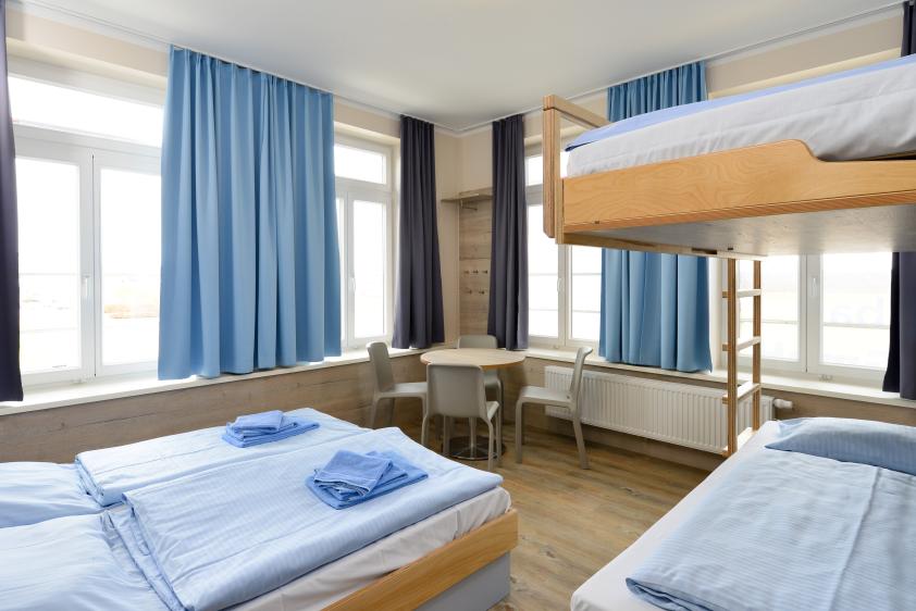 Eines unserer frisch sanierten Zimmer für Einzelgäste und Gruppen