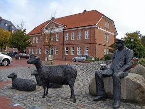 Marktplatz mit „Treiber mit Schafen“