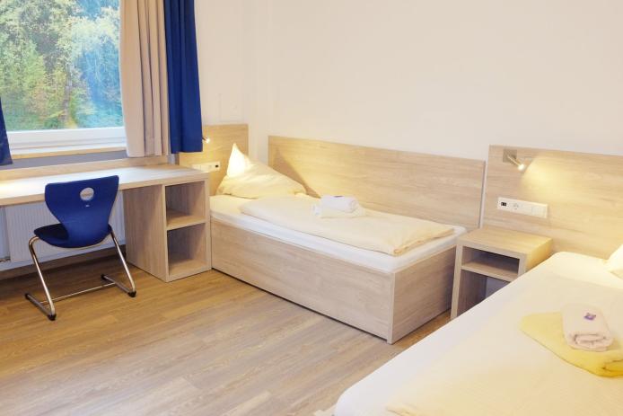 Neue Zimmer mit Einzelbetten