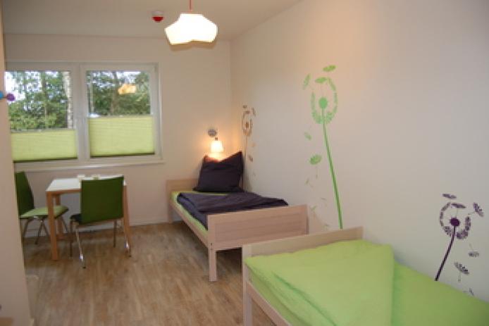 Das Leiterzimmer im neuen Westfügel mit Bad