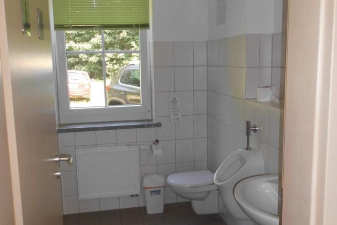 Toilette zum Kaminhaus