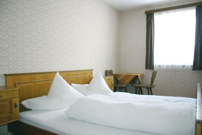 Schlafzimmer im Ferienhaus Lermoos