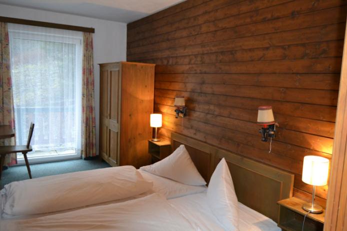 Schlafzimmer im Ferienhaus Lermoos