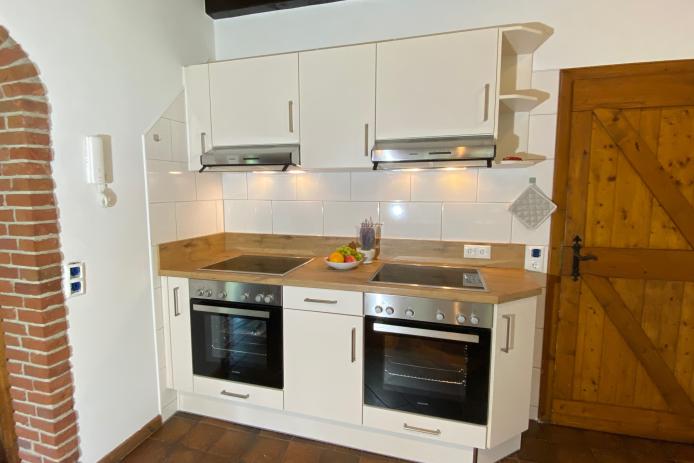 8 Platten und zwei Backöfen in der Küche sind vorhanden