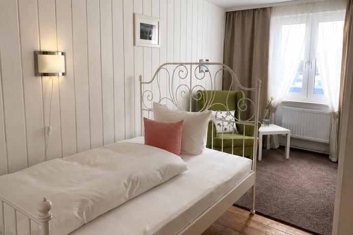 Zimmer mit Queensizebett  